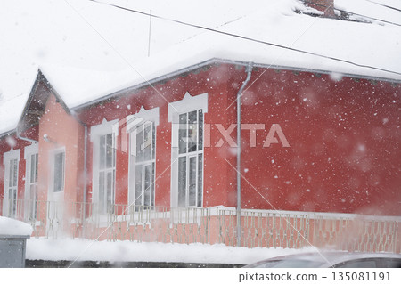 Raindrops on the window glass, Icy flowers - frozen window 135081191