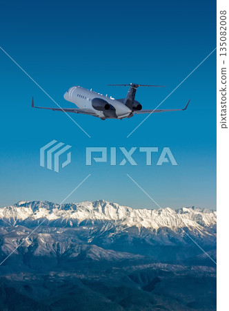 Modern private airplane is taking off in a resort mountain town 135082008