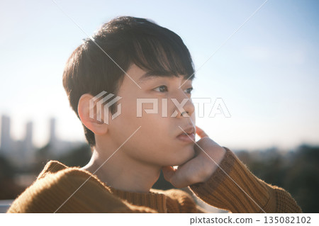 Man on the rooftop portrait 135082102