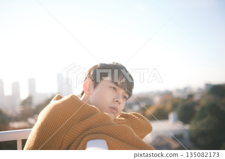 Man on the rooftop portrait 135082173