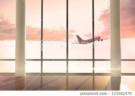 Airplane flying window at sunrise 135082470