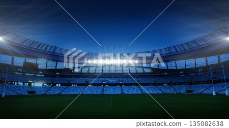 Stadium bowl is being shown in flat design with floodlights illuminating grass pitch, copy space Stadium bowl is being shown in flat design with floodlights illuminating grass pitch, copy space 135082638