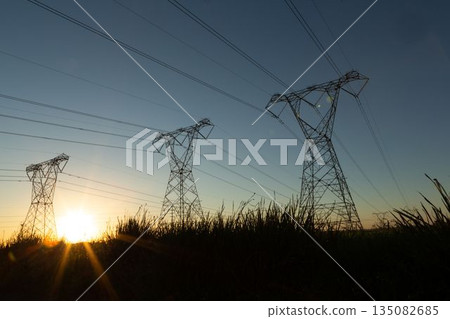 The evening electricity pylon silhouette The evening electricity pylon silhouette 135082685