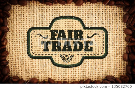 Vintage fair-trade label is sitting on flat-design burlap with coffee bean frame and wheat motif Vintage fair-trade label is sitting on flat-design burlap with coffee bean frame and wheat motif 135082760