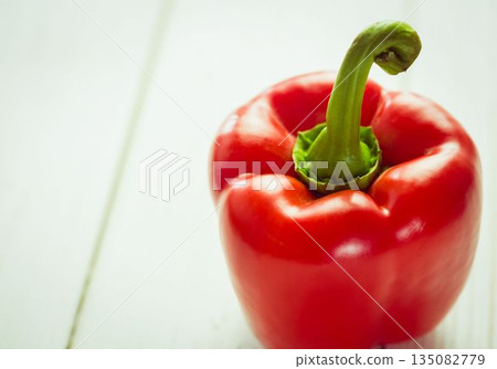 Fresh red pepper on wooden table Fresh red pepper on wooden table 135082779