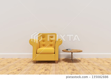 Yellow armchair by table on floor against wall 135082886