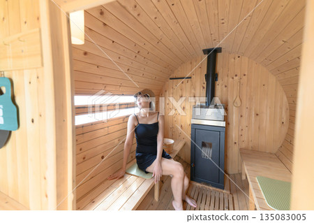 A woman taking a break in the sauna (Photo courtesy of Oki Seaside Resort Miyabi) A woman taking a break in the sauna (Photo courtesy of Oki Seaside Resort Miyabi) 135083005