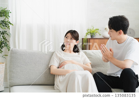 A husband supporting an emotionally unstable pregnant woman Lifestyle image A husband supporting an emotionally unstable pregnant woman Lifestyle image 135083135