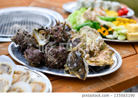 Preparing to grill oysters and turban shells (Photography cooperation: Oki Seaside Resort Miyabi) 135083190
