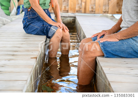 Enjoying a foot bath together [Photography cooperation: Oki Seaside Resort Miyabi] 135083301
