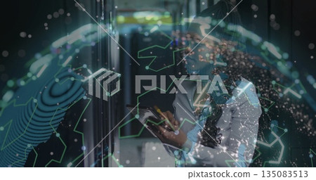 Using tablet IT professional navigating server rack corridor with holographic globe, copy space Using tablet IT professional navigating server rack corridor with holographic globe, copy space 135083513