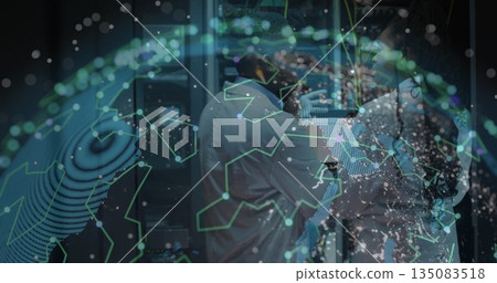 Two IT technicians in lab coats inspecting servers and cables in data center aisle, globe overlay Two IT technicians in lab coats inspecting servers and cables in data center aisle, globe overlay 135083518