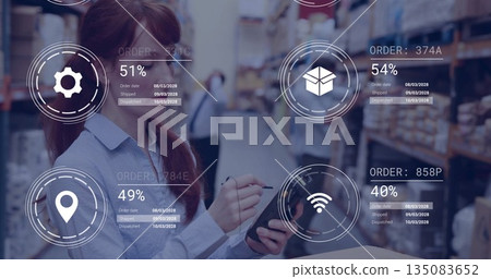 Holding tablet with stylus, female worker scanning inventory in warehouse aisle, with digital icons Holding tablet with stylus, female worker scanning inventory in warehouse aisle, with digital icons 135083652