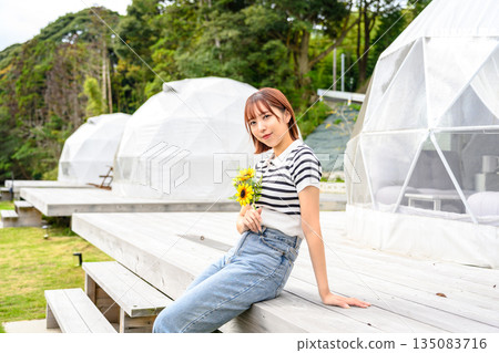 Glamping, sunflowers, and women [Photography cooperation: Oki Seaside Resort Miyabi] 135083716