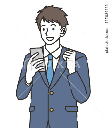 High school boy happy to see his smartphone High school boy happy to see his smartphone 135084333
