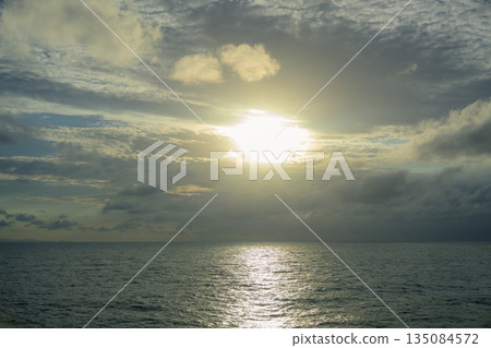 Cloudy sky and light on the sea surface 135084572