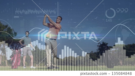 Mature couple playing golf on lush fairway, with man swinging club, wheeled bag and data overlay Mature couple playing golf on lush fairway, with man swinging club, wheeled bag and data overlay 135084848