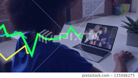 Holding laptop, woman conducting remote meeting at office desk, with plant and waveform overlay Holding laptop, woman conducting remote meeting at office desk, with plant and waveform overlay 135086275