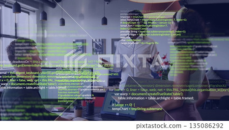 Discussing code, professionals in shirts gesturing in meeting room, with laptop and mug Discussing code, professionals in shirts gesturing in meeting room, with laptop and mug 135086292
