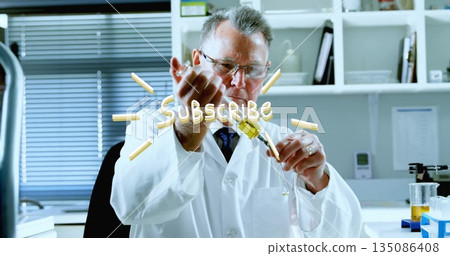 Senior scientist transferring yellow liquid into test tube using pipette in lab with subscribe text Senior scientist transferring yellow liquid into test tube using pipette in lab with subscribe text 135086408