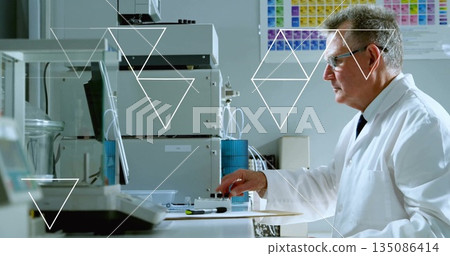 Senior male scientist pipetting samples at laboratory bench, with instrument modules, copy space Senior male scientist pipetting samples at laboratory bench, with instrument modules, copy space 135086414