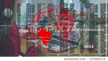 Typing grandparents and granddaughter using two laptops at table at home with red globe graphic 135086554