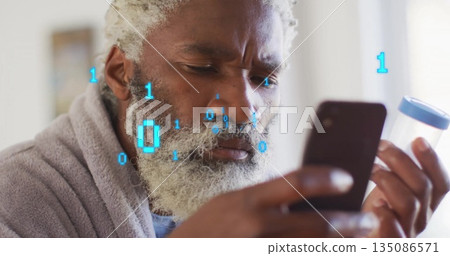 Standing man in bathrobe holding smartphone and pill bottle by bedroom window, with binary overlay 135086571