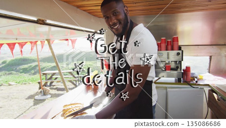 Grilling cook wearing dark apron and gloves in food trailer, with sausages tongs and coffee machine Grilling cook wearing dark apron and gloves in food trailer, with sausages tongs and coffee machine 135086686