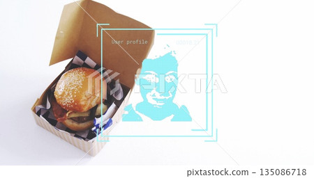 Sesame-seed burger sitting in box with liner on tabletop, cyan overlay user profile, copy space Sesame-seed burger sitting in box with liner on tabletop, cyan overlay user profile, copy space 135086718
