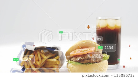 Showcasing burger with lettuce and tomato on studio tabletop, featuring fries, cola and UI icons Showcasing burger with lettuce and tomato on studio tabletop, featuring fries, cola and UI icons 135086732