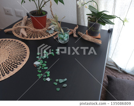 Meditation corner in home. Tranquility, traditional practices, and lifestyle. Interior, nature, and people. 135086809