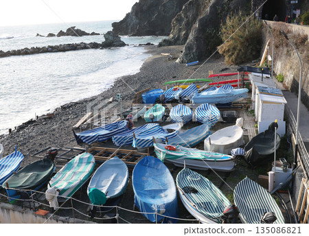 Fishing boats by sea. Nature in mountains of Italy, Cinque Terre. Monterosso and background for design.  135086821