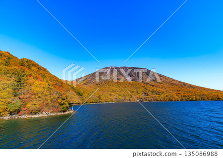 Lake Chuzenji in autumn, Nikko City, Tochigi Prefecture (Mount Nantai seen from a sightseeing boat) Lake Chuzenji in autumn, Nikko City, Tochigi Prefecture (Mount Nantai seen from a sightseeing boat) 135086988