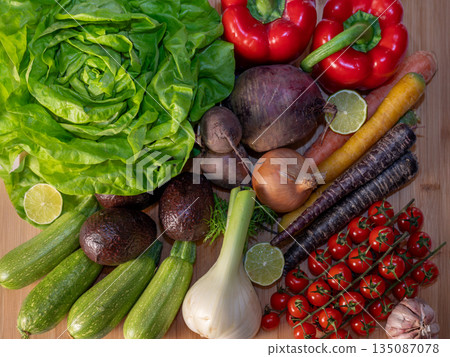 Assortment of fresh organic vegetables in baskets at a farmers market or supermarket. Healthy natural products for diet, clean eating, and sustainable lifestyle. Assortment of fresh organic vegetables in baskets at a farmers market or supermarket. Healthy natural products for diet, clean eating, and sustainable lifestyle. 135087078