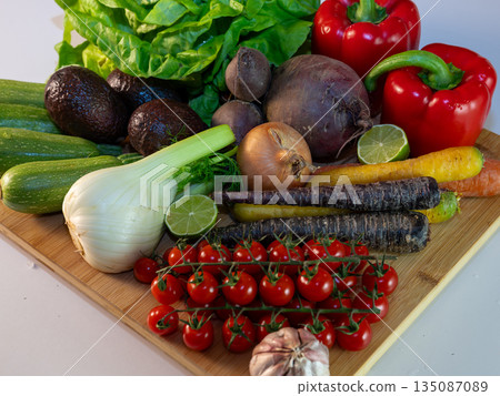 Assortment of fresh organic vegetables in baskets at a farmers market or supermarket. Healthy natural products for diet, clean eating, and sustainable lifestyle. Assortment of fresh organic vegetables in baskets at a farmers market or supermarket. Healthy natural products for diet, clean eating, and sustainable lifestyle. 135087089
