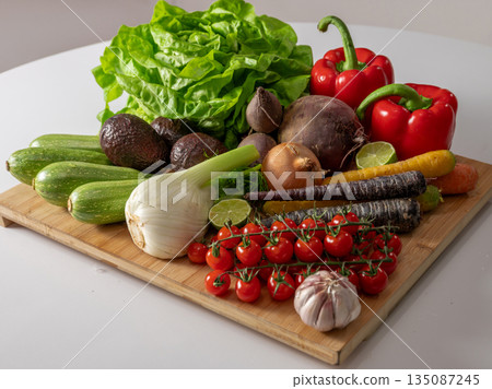Assortment of fresh organic vegetables in baskets at a farmers market or supermarket. Healthy natural products for diet, clean eating, and sustainable lifestyle. Assortment of fresh organic vegetables in baskets at a farmers market or supermarket. Healthy natural products for diet, clean eating, and sustainable lifestyle. 135087245