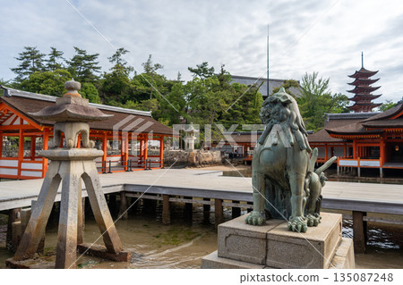 View of Itsukushima Shrine and pagoda on Miyajima island, Japan 135087248