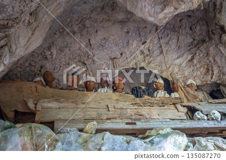 Tau Tau statues in a cave, Toraja, Sulawesi, Indonesia Tau Tau statues in a cave, Toraja, Sulawesi, Indonesia 135087270