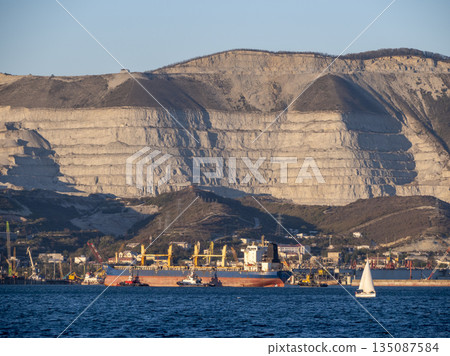Large cargo ship Kual Bang Hai 16 entering the port of Novorossiysk Russia. Commercial vessel arriving at the Black Sea port. Large cargo ship Kual Bang Hai 16 entering the port of Novorossiysk Russia. Commercial vessel arriving at the Black Sea port. 135087584