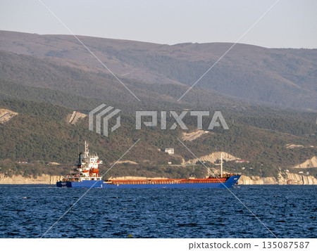 August 22 2025 Cargo ship Ege Bey sailing near Novorossiysk Russia on the Black Sea. Large commercial vessel moving along the coastline August 22 2025 Cargo ship Ege Bey sailing near Novorossiysk Russia on the Black Sea. Large commercial vessel moving along the coastline 135087587