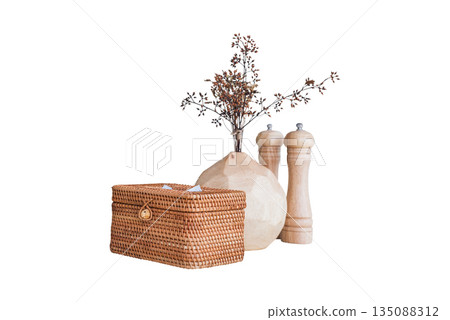 dry plant in bamboo basket isolated on white background,Dried flowers and wicker accessories on table decoration, white backdrop 135088312