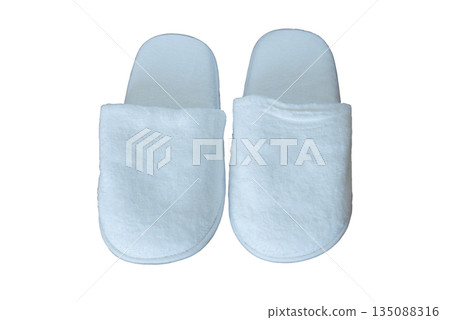 blue slippers isolated on white background,Soft white slippers for indoor use. Photo on white background. Isolated object. blue slippers isolated on white background,Soft white slippers for indoor use. Photo on white background. Isolated object. 135088316