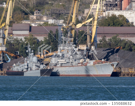 August 22 2025 View of Novorossiysk port Russia with cargo ships and cranes on the coastline. Industrial maritime scene on the Black Sea August 22 2025 View of Novorossiysk port Russia with cargo ships and cranes on the coastline. Industrial maritime scene on the Black Sea 135088632