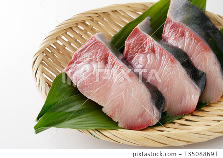 Yellowtail fillets before cooking (Japanese style presentation, white background) 135088691