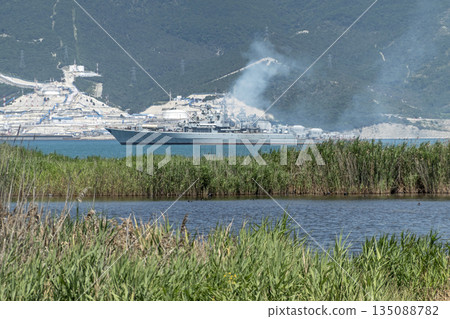 August 20, 2022: Military warship anchored in the Black Sea, Russia, representing naval presence, maritime security and military activity in open waters August 20, 2022: Military warship anchored in the Black Sea, Russia, representing naval presence, maritime security and military activity in open waters 135088782