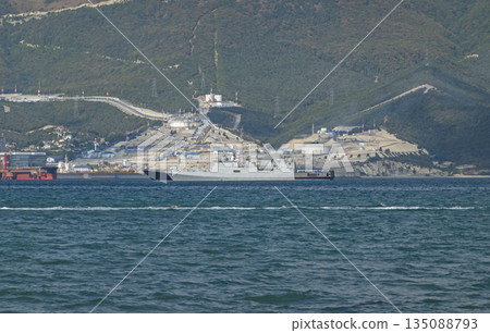 August 20, 2022: Military warship anchored in the Black Sea, Russia, representing naval presence, maritime security and military activity in open waters 135088793