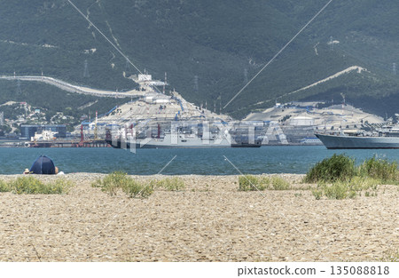 August 20, 2022: Military warship anchored in the Black Sea, Russia, representing naval presence, maritime security and military activity in open waters August 20, 2022: Military warship anchored in the Black Sea, Russia, representing naval presence, maritime security and military activity in open waters 135088818