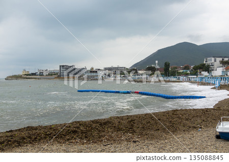 August 24, 2025: Myskhako beach in Russia with the sea and resort area, showing coastal recreation, tourism infrastructure and summer seaside life August 24, 2025: Myskhako beach in Russia with the sea and resort area, showing coastal recreation, tourism infrastructure and summer seaside life 135088845