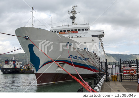 August 22 2025 Passenger ship Knyaz Vladimir docked in the port of Novorossiysk Russia on the Black Sea coast. River and sea vessel moored near the harbor August 22 2025 Passenger ship Knyaz Vladimir docked in the port of Novorossiysk Russia on the Black Sea coast. River and sea vessel moored near the harbor 135090049
