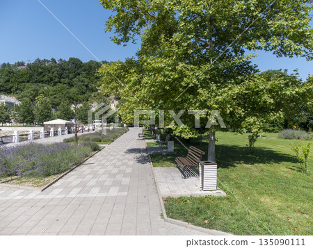 August 19, 2025 The promenade along Lake Abrau-Dyurso with calm water, greenery, and scenic surroundings August 19, 2025 The promenade along Lake Abrau-Dyurso with calm water, greenery, and scenic surroundings 135090111